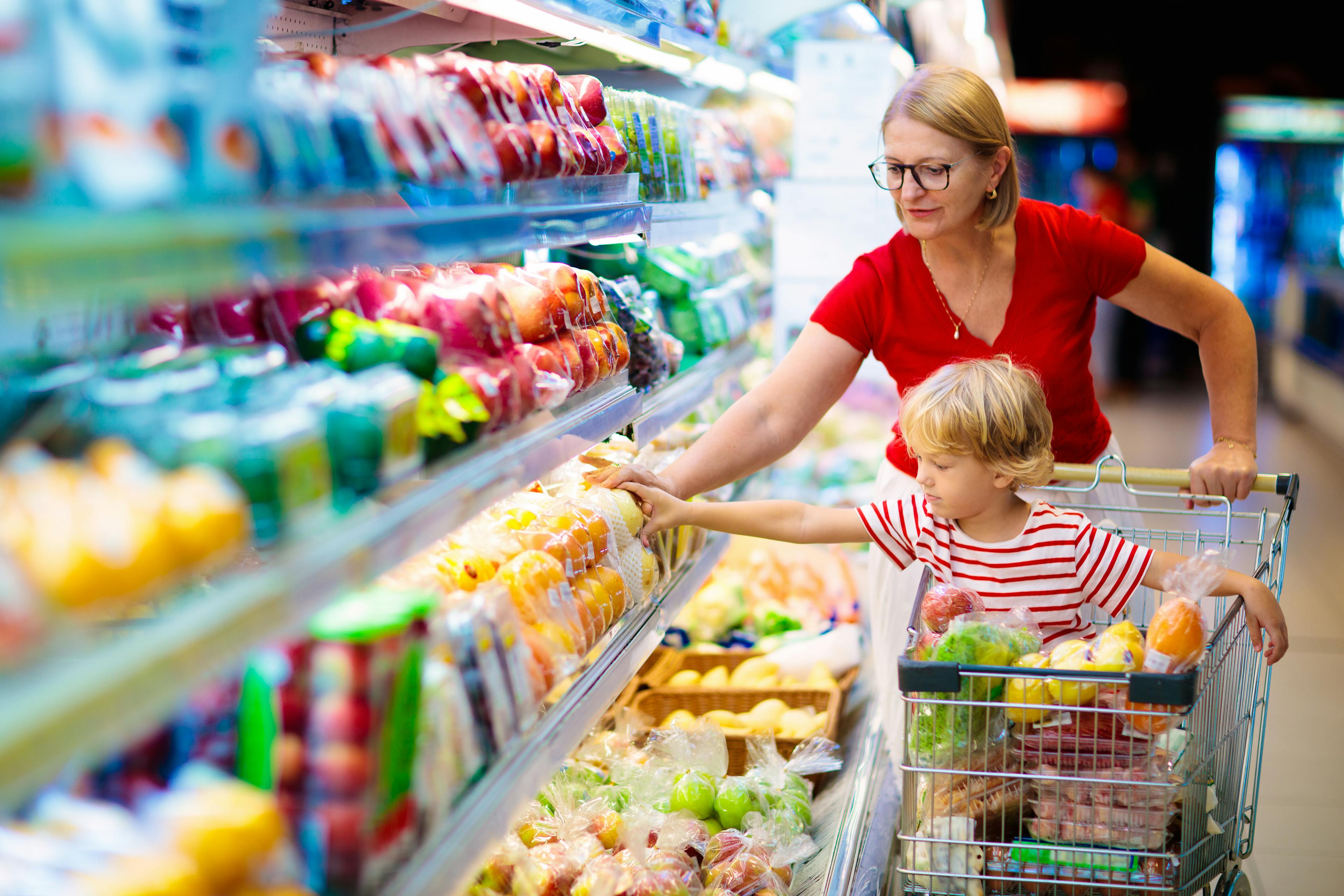 woman and child shopping for fresh produce