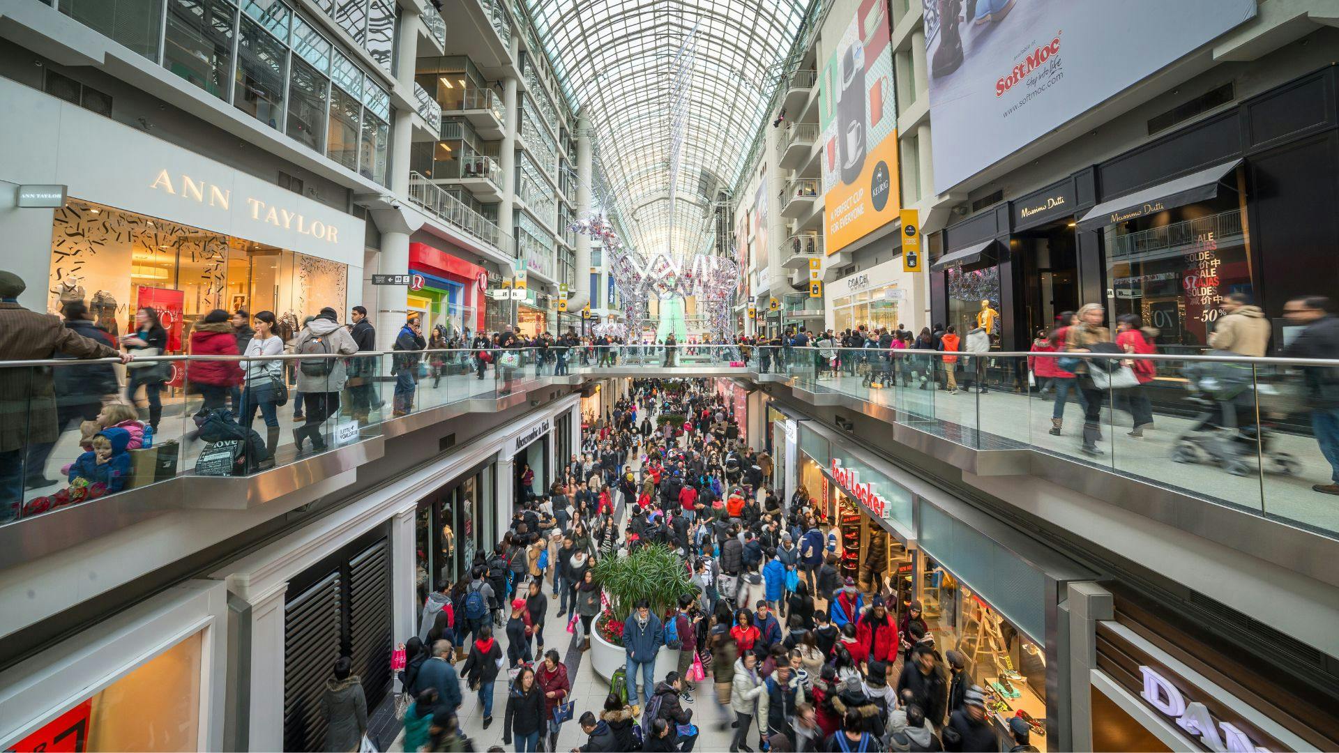 busy double-story mall filled with shoppers